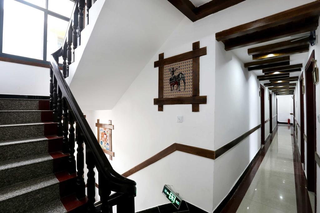 Bugu Hostel Улинъюань Экстерьер фото